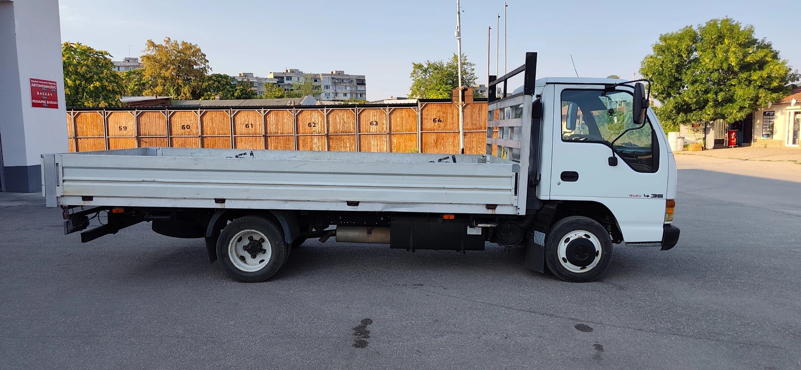 Isuzu Npr Бордови 4.60 д. 2.10ш. * КЛИМАТИК* , снимка 3 - Камиони - 55754155