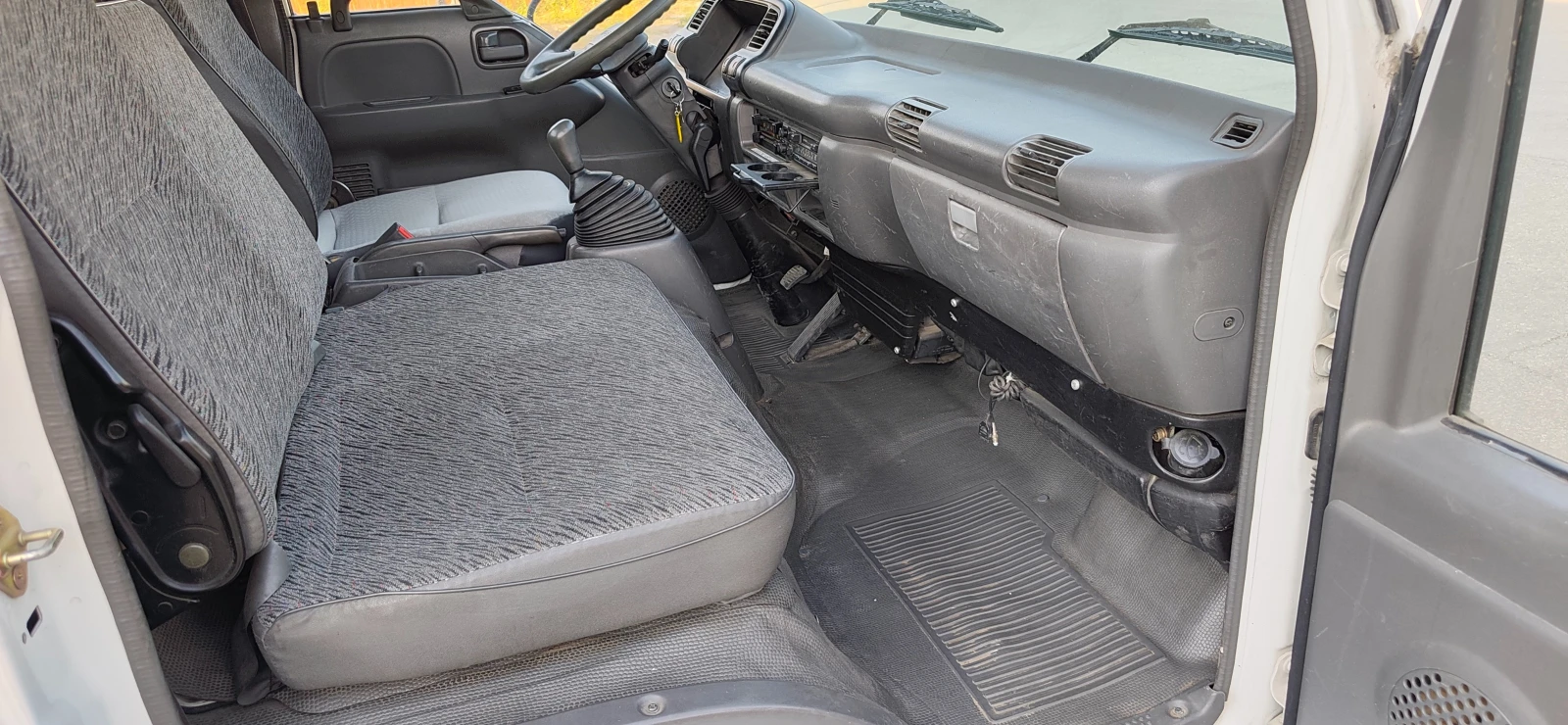 Isuzu Npr Бордови 4.60 д. 2.10ш. * КЛИМАТИК* , снимка 16 - Камиони - 55754155