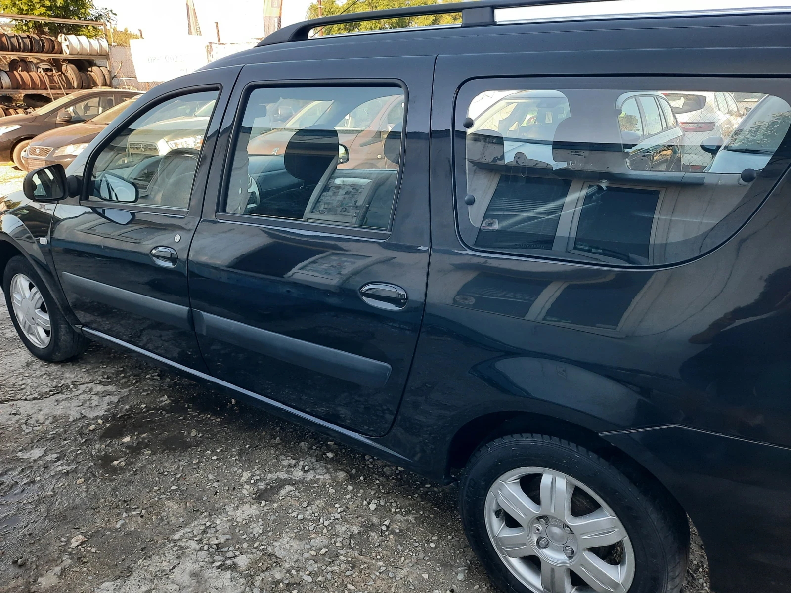 Dacia Logan 2010та 1.6i 6+ 1 A/C, снимка 4 - Автомобили и джипове - 54683673