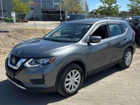 ������ Nissan Rogue