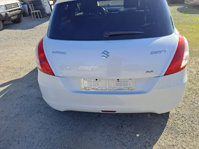 Suzuki Swift 1.3 бензин 4х4, снимка 4 - Автомобили и джипове - 47883054