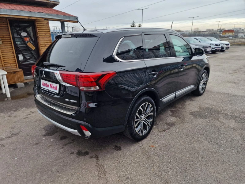 Mitsubishi Outlander 2.2DI-D-NAVI-CAMERA-5МЕСТА-4X4, снимка 4 - Автомобили и джипове - 53595100