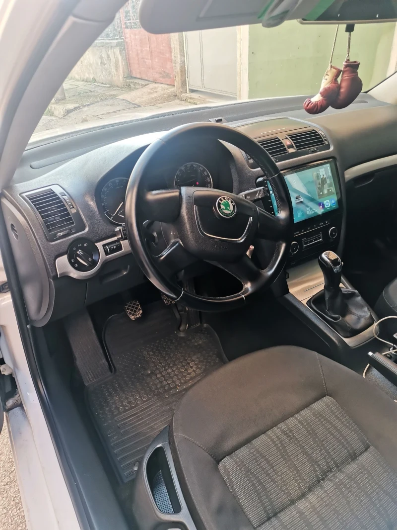 Skoda Octavia 2012 105кс ТОП, снимка 15 - Автомобили и джипове - 52390473