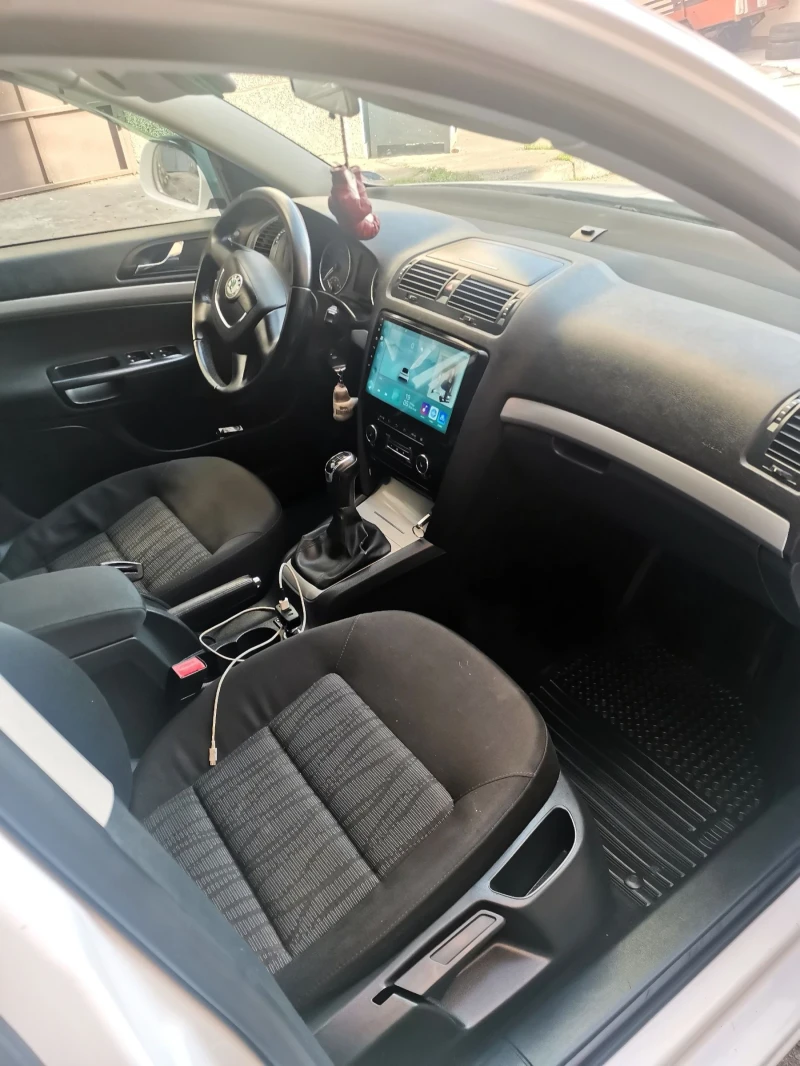 Skoda Octavia 2012 105кс ТОП, снимка 17 - Автомобили и джипове - 52390473