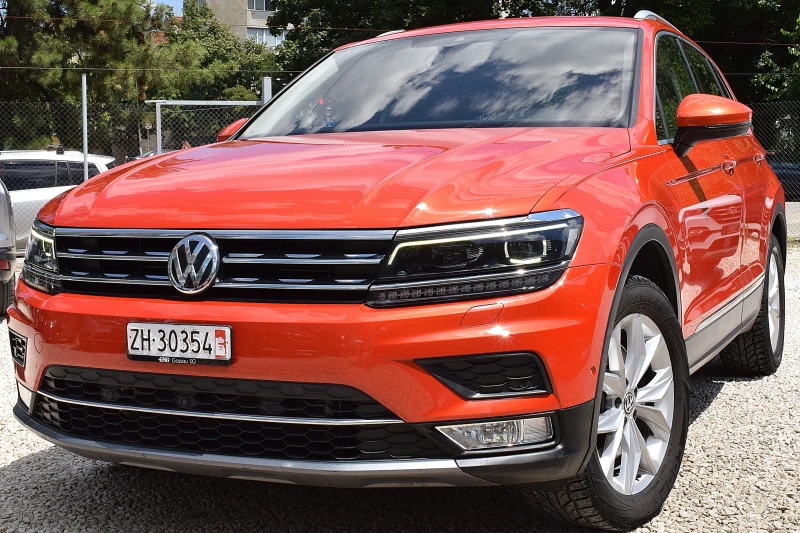 VW Tiguan 2.0ШВЕЙЦАРИЯ-ДИСТРОНИК/КОЖА/НАВИ/LANE ASSIST/4x4 - 34650 лв. - 34421260 1