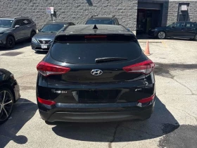 Hyundai Tucson Luxury /CARFAX/Кожа/Нави/Панорама/Подгрев/Клип, снимка 4