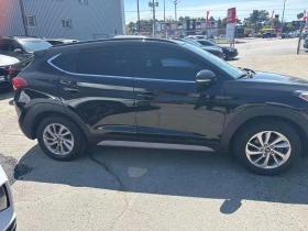 Hyundai Tucson Luxury /CARFAX/Кожа/Нави/Панорама/Подгрев/Клип, снимка 3