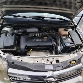 Opel Astra Twinport , снимка 5
