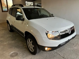 Обява за продажба на Dacia Duster 1.6i 4x4 KLIMATIK SWISS ~14 999 лв. - изображение 1