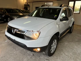 Обява за продажба на Dacia Duster 1.6i 4x4 KLIMATIK SWISS ~14 999 лв. - изображение 1