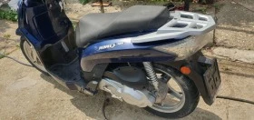 Kymco People 125 става за А1 лек икономичен и пъргав, снимка 6