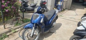 Kymco People 125 става за А1 лек икономичен и пъргав, снимка 5