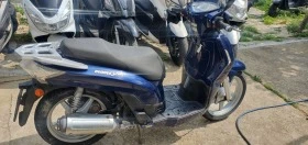 Kymco People 125 става за А1 лек икономичен и пъргав, снимка 2