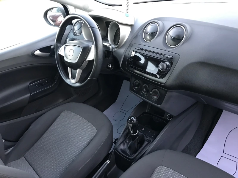 Seat Ibiza 1.2TDi-клима, снимка 14 - Автомобили и джипове - 45540213