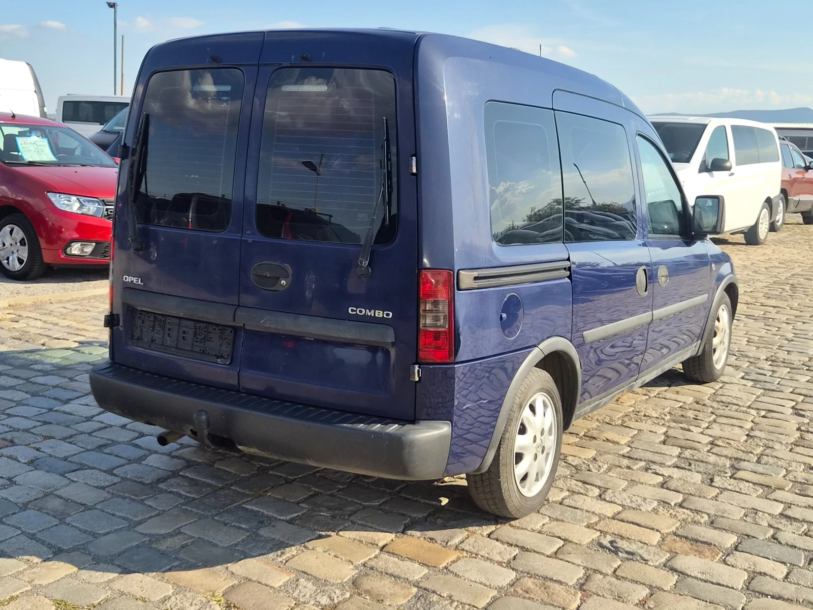 Opel Combo 1.6i 87кс КЛИМАТИК 5 МЕСТА ЕВРО 4, снимка 4 - Автомобили и джипове - 56128503