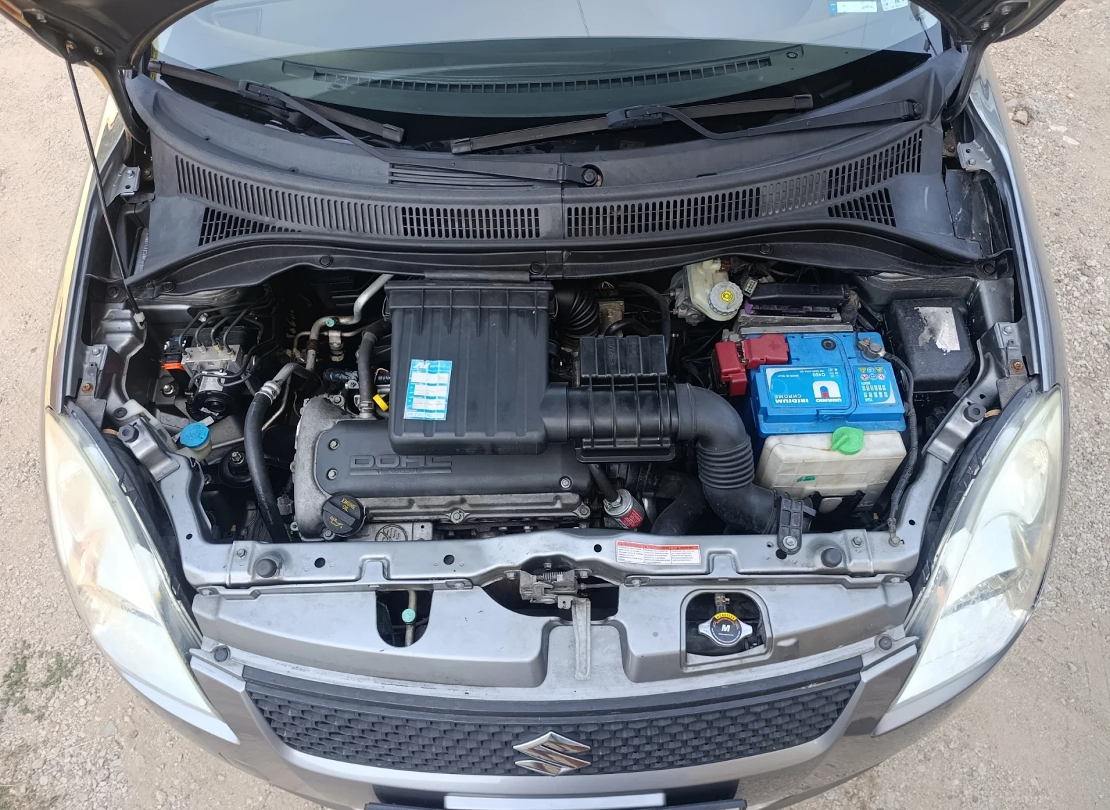 Suzuki Swift 1.3i, снимка 15 - Автомобили и джипове - 55853441