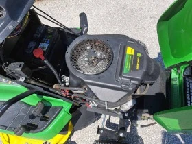 Сенокосачка John Deere X 305 R, снимка 17