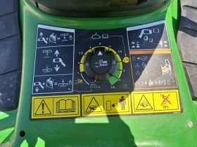 Сенокосачка John Deere X 305 R, снимка 15