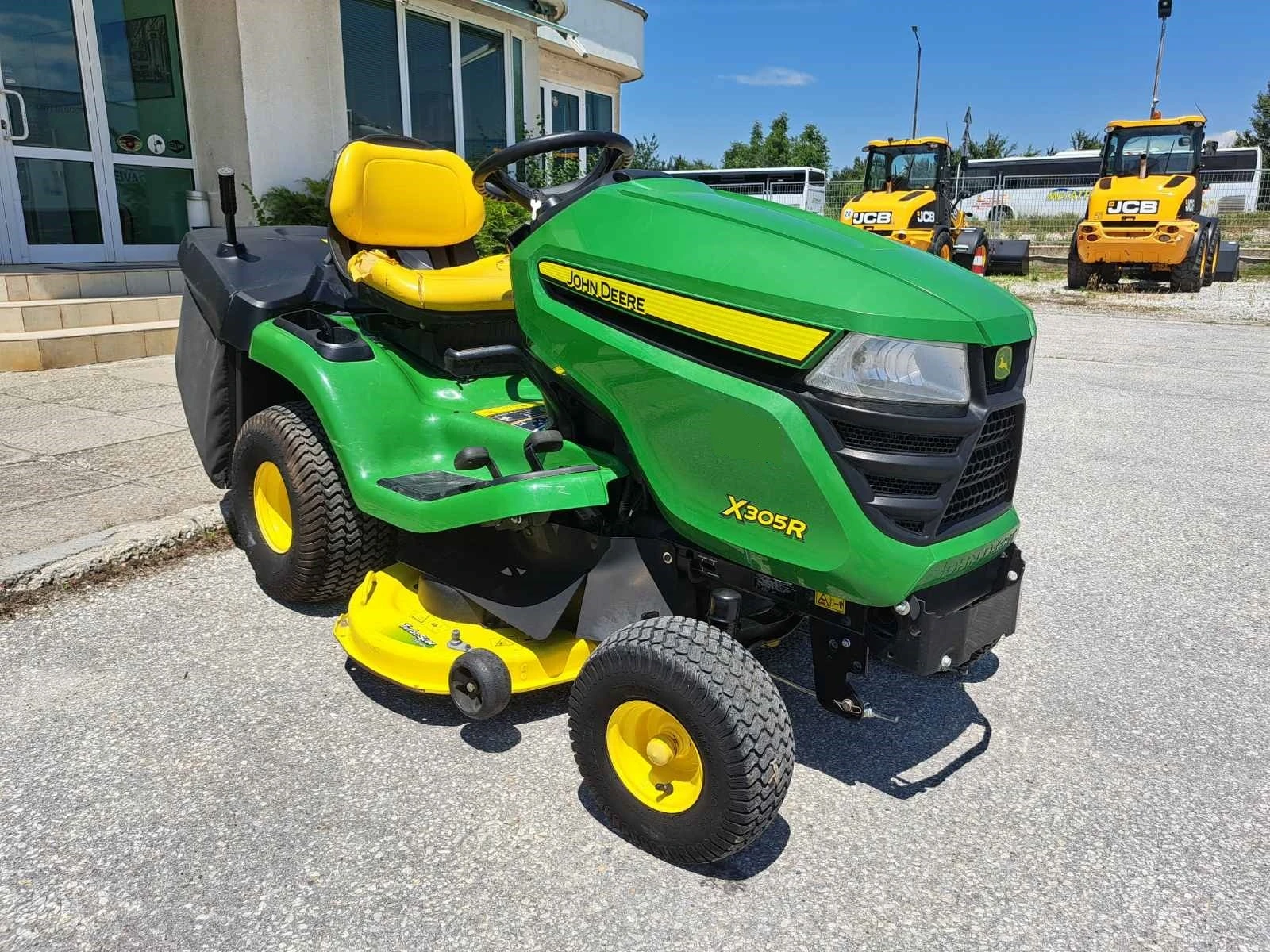 Сенокосачка John Deere X 305 R - изображение 7