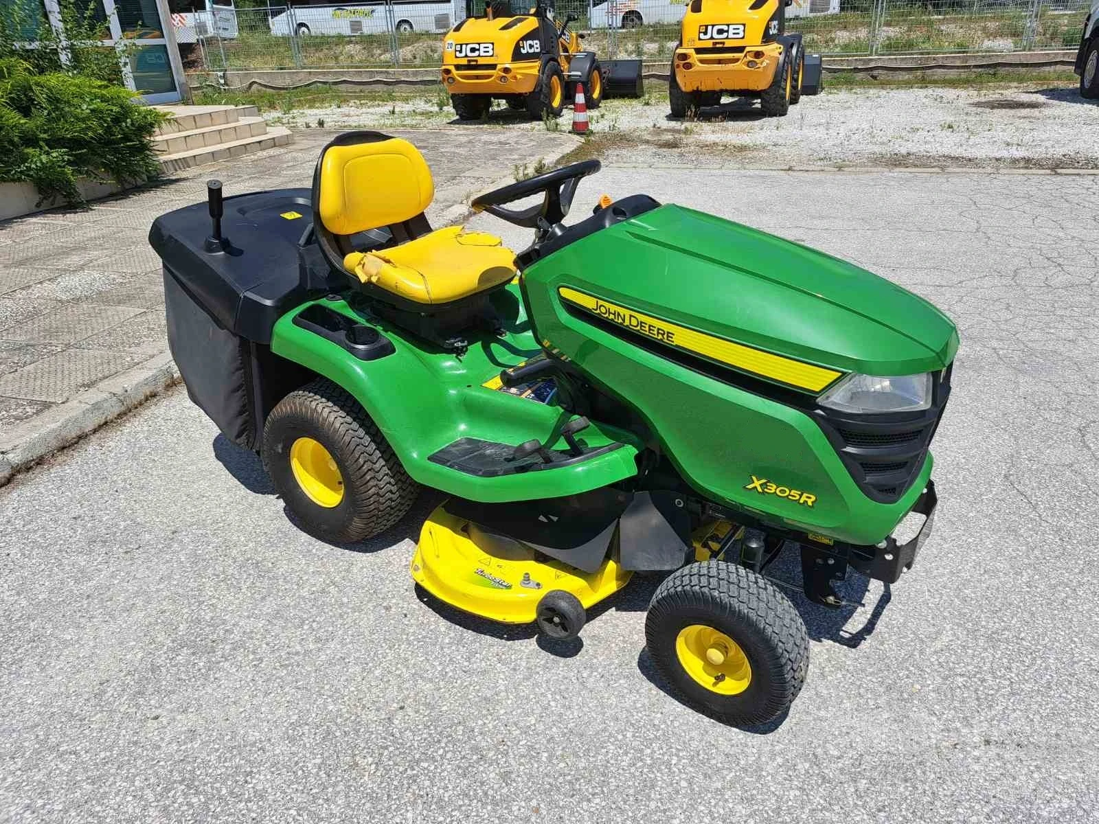 Сенокосачка John Deere X 305 R - изображение 6