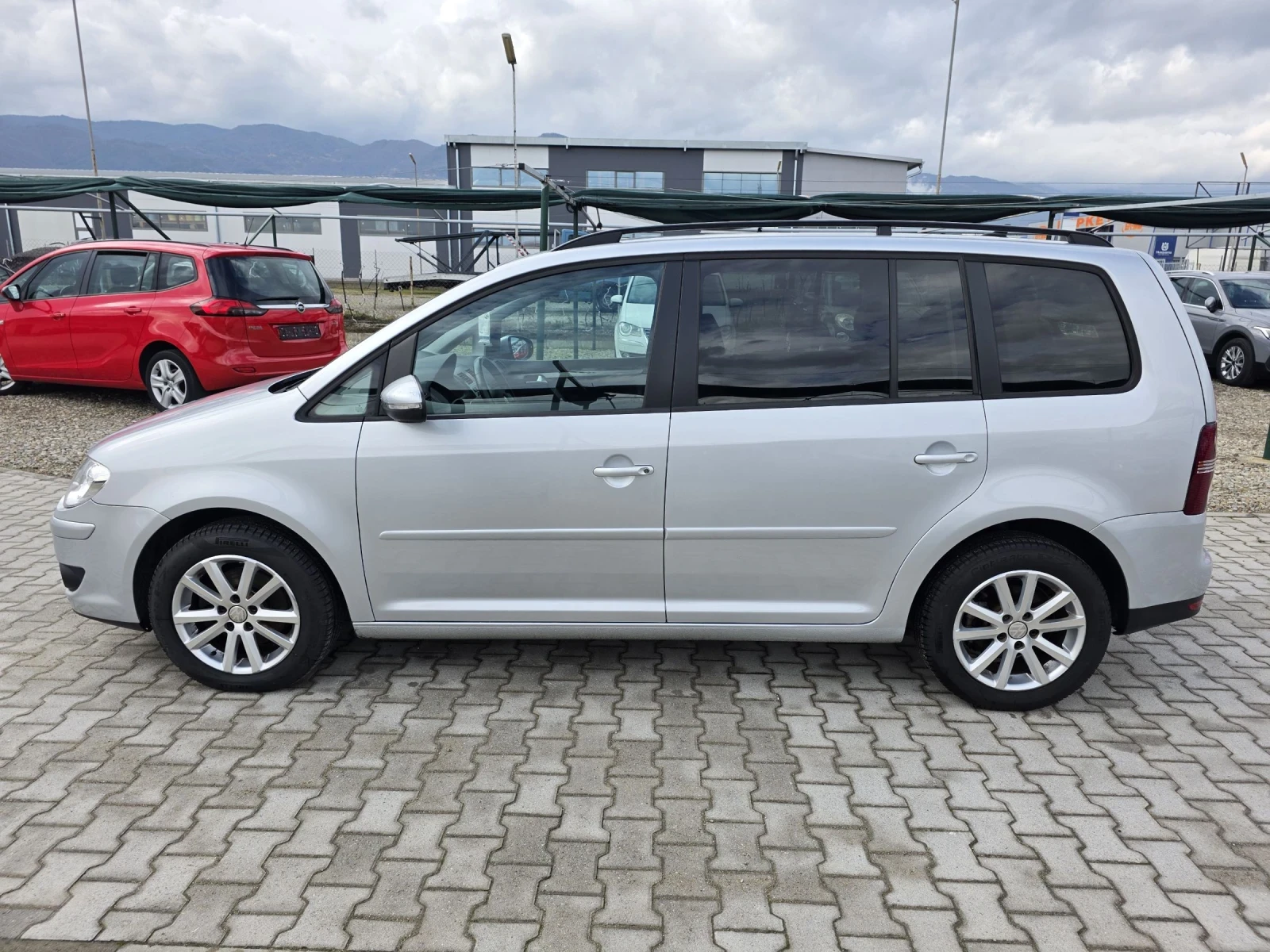 VW Touran 2.0TDi 7 154000 Navi  | Mobile.bg   4