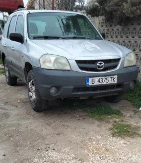 ������ Mazda Tribute