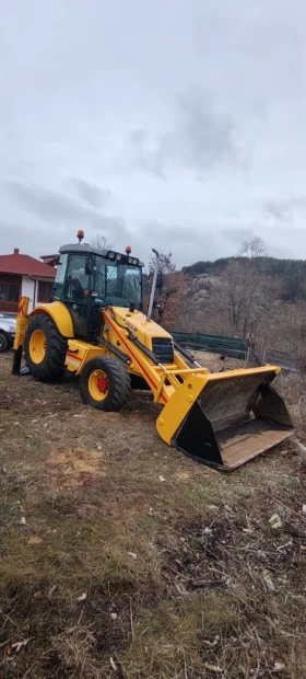      New Holland LB110B-4PT