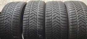 Гуми Зимни 255/40R21, снимка 1