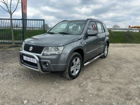 Suzuki Grand vitara 2.0-РЪЧКА-4x4-RollBars-МУЛТИМЕДИЯ-БЕЗ-РЪЖДА!