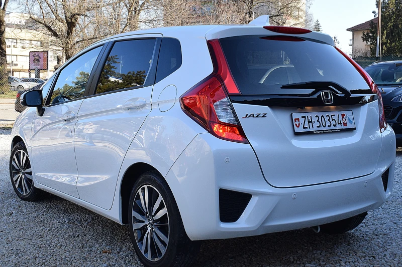 Honda Jazz 1.3ШВЕЙЦАРИЯ/КЛИМАТРОНИК/Keyles/Халогени/Осова/Лед, снимка 7 - Автомобили и джипове - 48719325