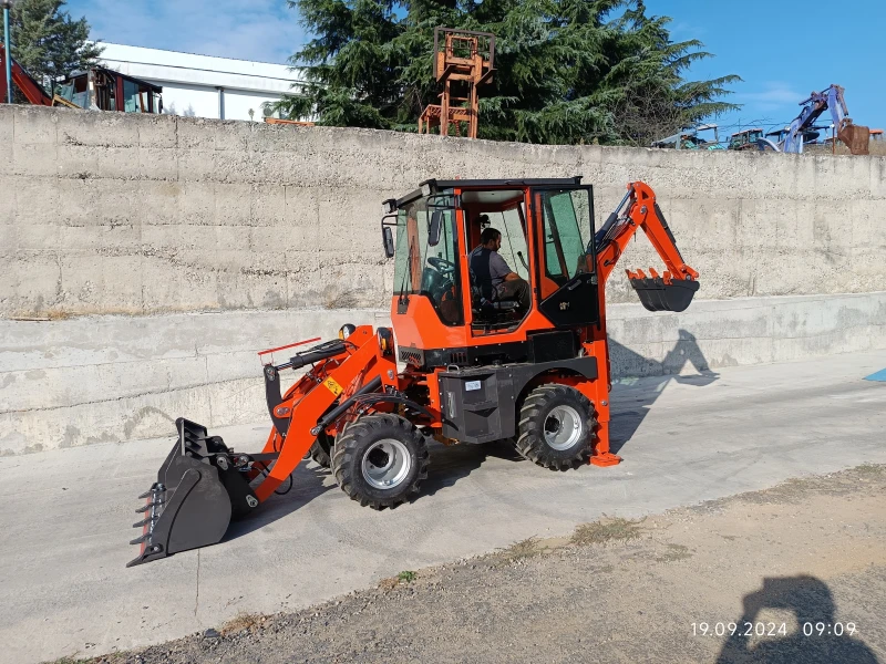 Телескопичен товарач Komatsu комбиниран багер, снимка 7 - Селскостопанска техника - 47289088