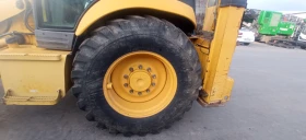 Багер Komatsu WB93R-5, снимка 5