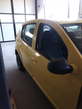 Обява за продажба на Dacia Sandero 1.4i ~1 111 лв. - изображение 10
