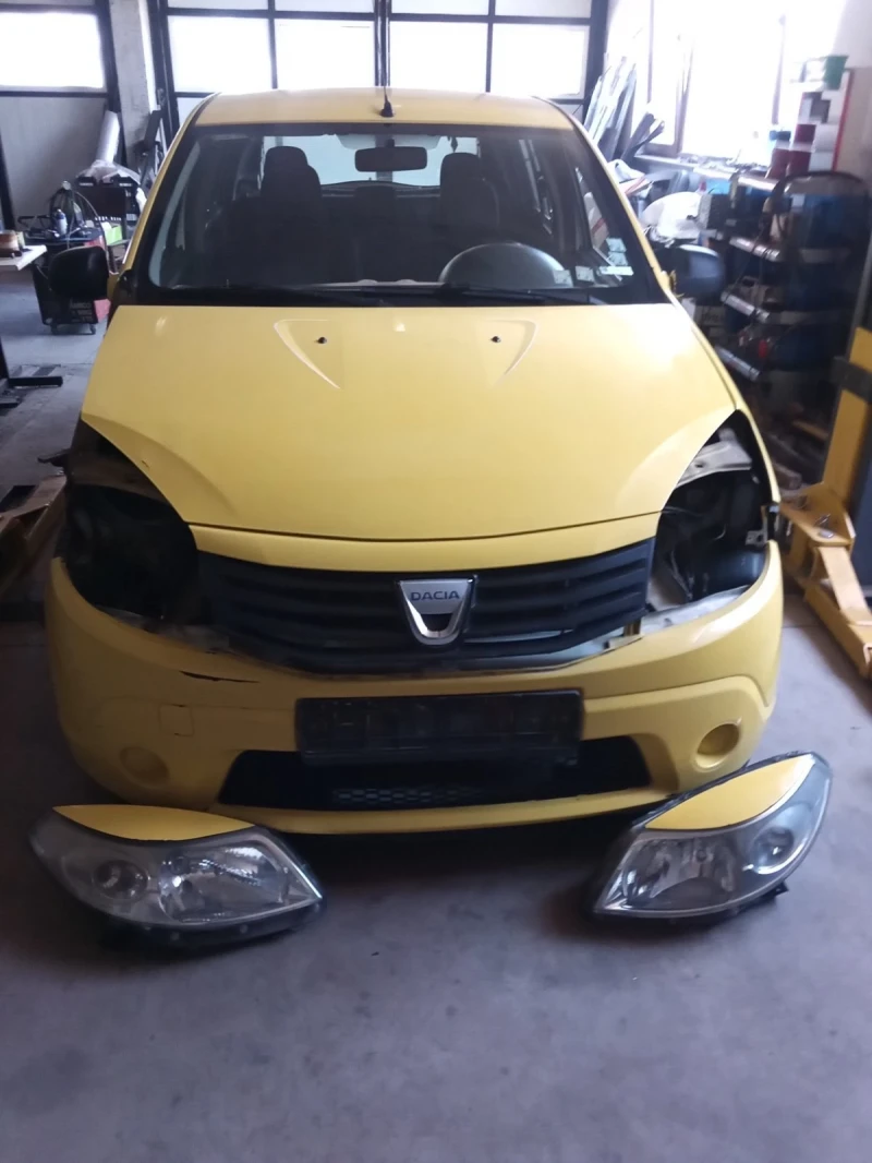 Dacia Sandero 1.4i, снимка 10 - Автомобили и джипове - 51817789