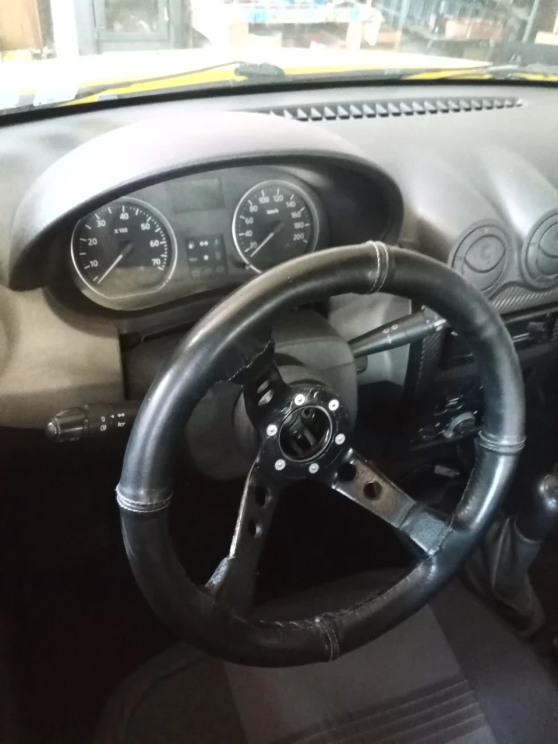 Dacia Sandero 1.4i, снимка 7 - Автомобили и джипове - 51817789