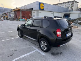 Dacia Duster 1.6i фабрична газ!, снимка 17