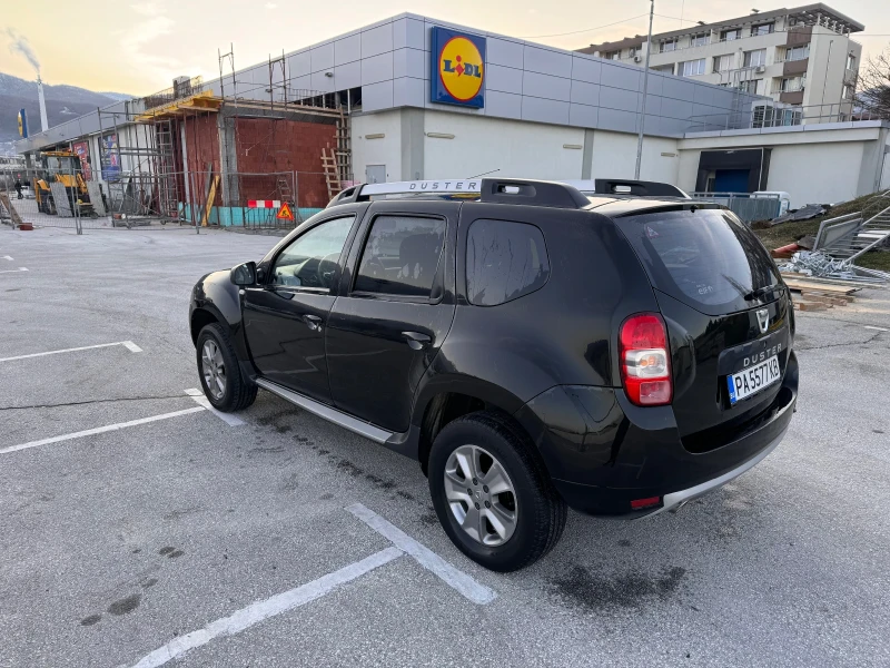 Dacia Duster 1.6i фабрична газ!, снимка 17 - Автомобили и джипове - 48542021