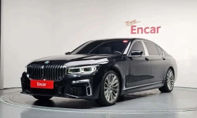 BMW 750, снимка 1