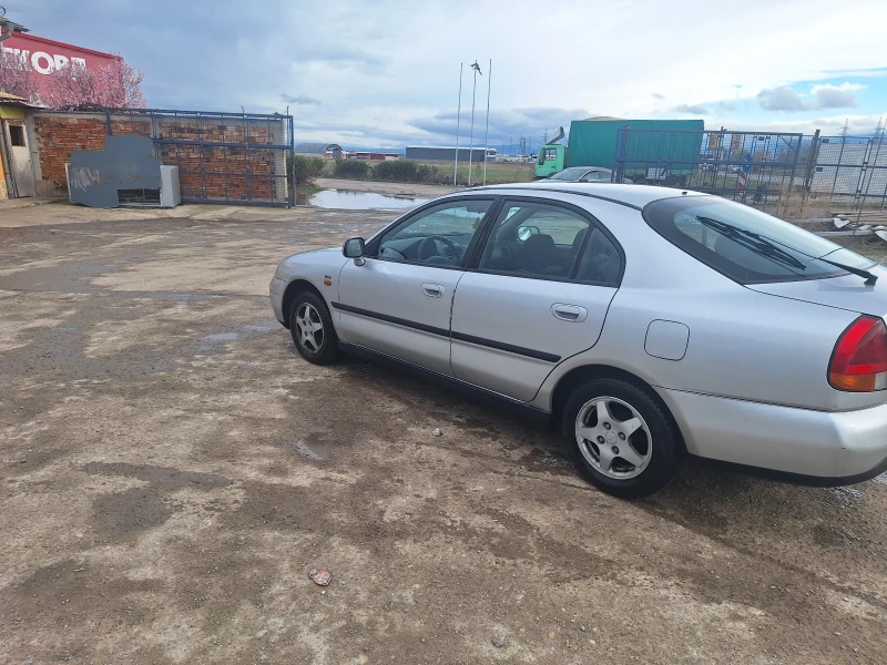 Mitsubishi Carisma, снимка 5 - Автомобили и джипове - 52149056