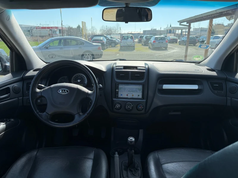 Kia Sportage 2.0i 4x4, снимка 7 - Автомобили и джипове - 53600267