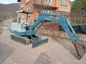 Багер Mitsubishi ME30, снимка 5