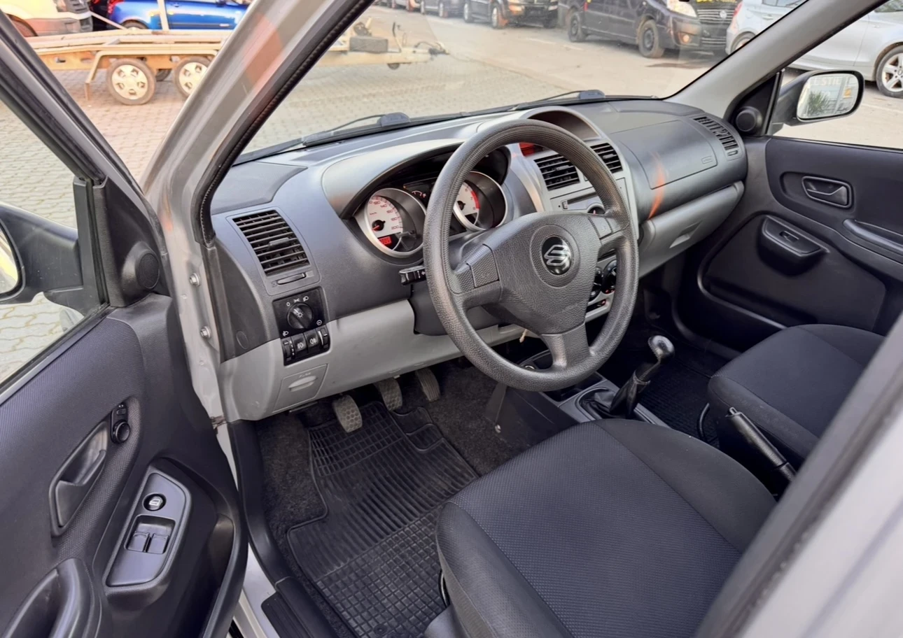 Suzuki Ignis 1.3i / 4x4 / Климатик / + комплект зимни гуми/ - изображение 5