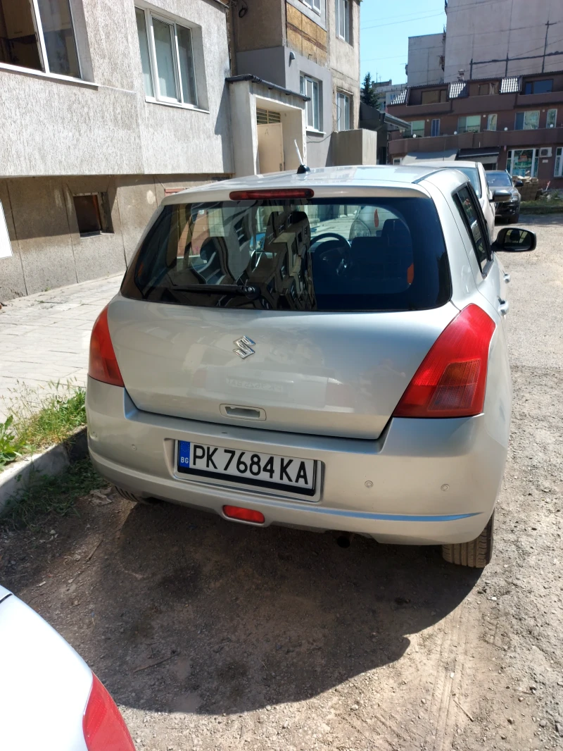 Suzuki Swift 1.3бензин 4х4 , снимка 4 - Автомобили и джипове - 52662701