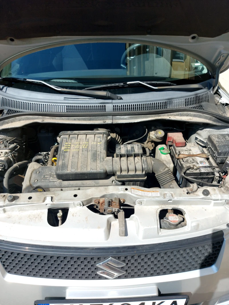 Suzuki Swift 1.3бензин 4х4 , снимка 11 - Автомобили и джипове - 52662701