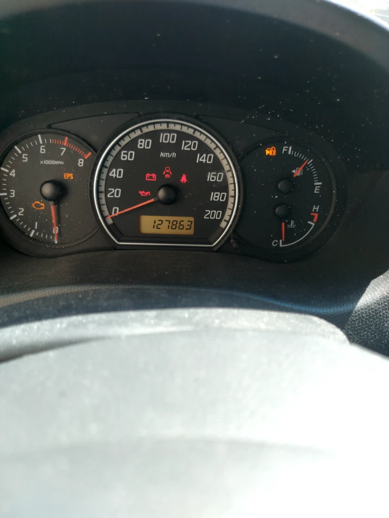 Suzuki Swift 1.3бензин 4х4 , снимка 6 - Автомобили и джипове - 52662701