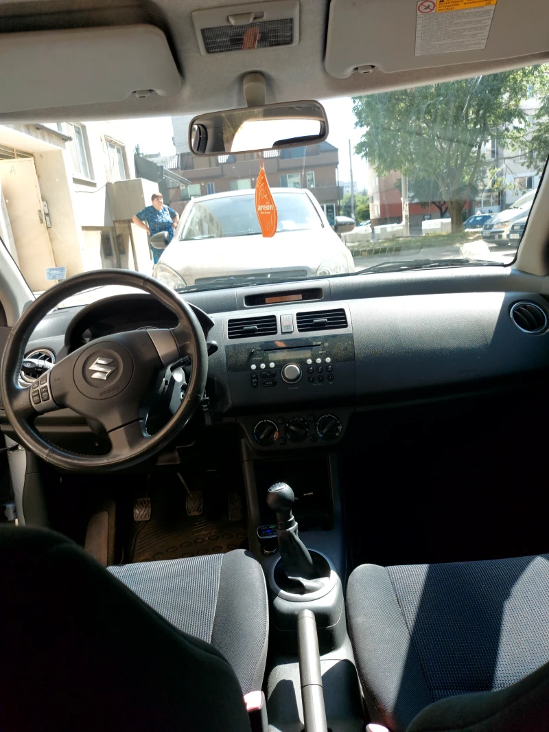 Suzuki Swift 1.3бензин 4х4 , снимка 9 - Автомобили и джипове - 52662701