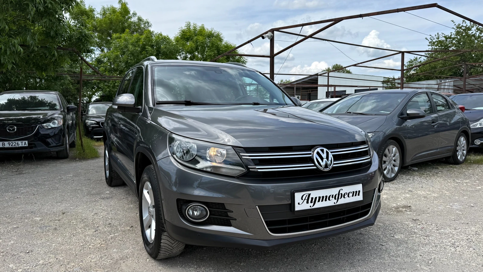 VW Tiguan 2.0TDI 4X4 ФЕЙСЛИФТ ПАНОРАМА, ПАРК АСИСТЕН, снимка 2 - Автомобили и джипове - 54610146