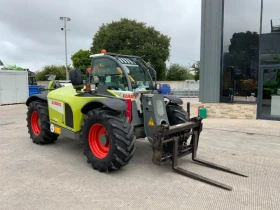       Claas 7030 Scorpion