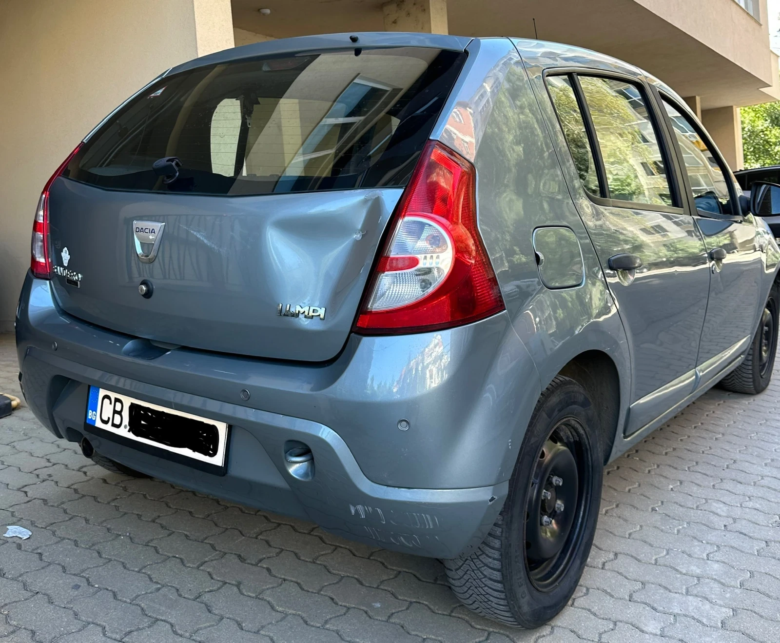 Dacia Sandero 1.4, газ, клима, Laureate закупен от Бг, снимка 8 - Автомобили и джипове - 56004696