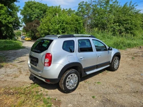 Обява за продажба на Dacia Duster 1.6i КЛИМАТИК
